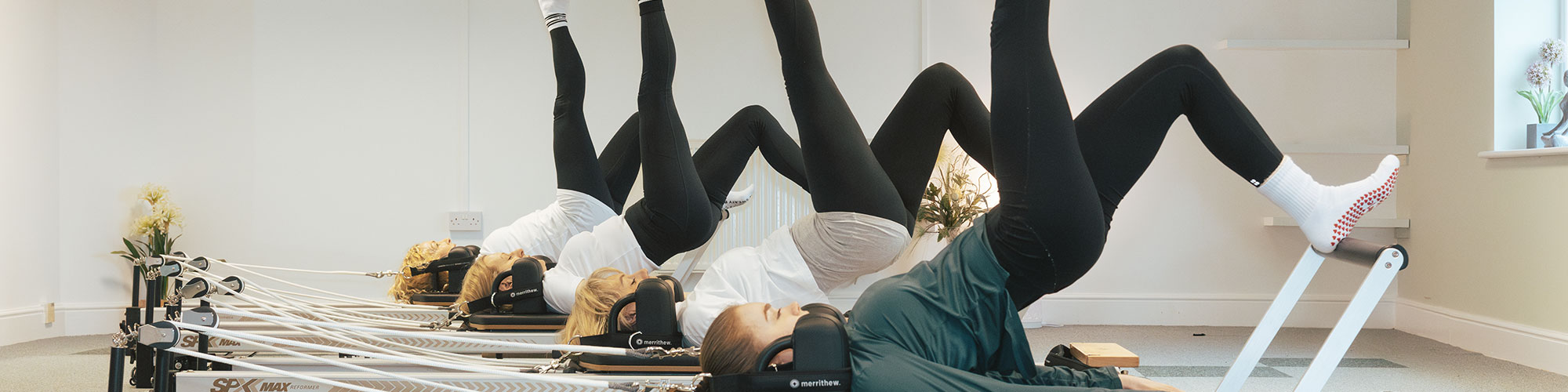Group doing reformer class in Wrexham